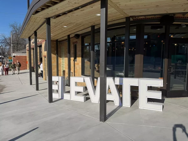 3D Elevate Letters Outside in front of a building